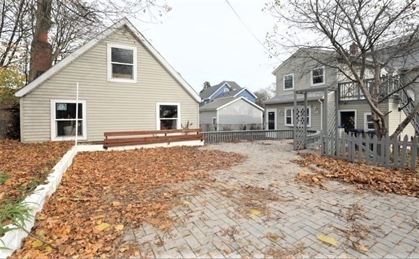 24 Elm Street Boston, MA 02136 - Photo 19 of 27 a front view of a house with a yard