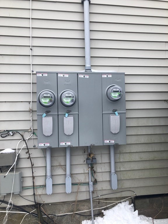 24 Elm Street Boston, MA 02136 - Photo 23 of 27 a bathroom with a sink and a vanity