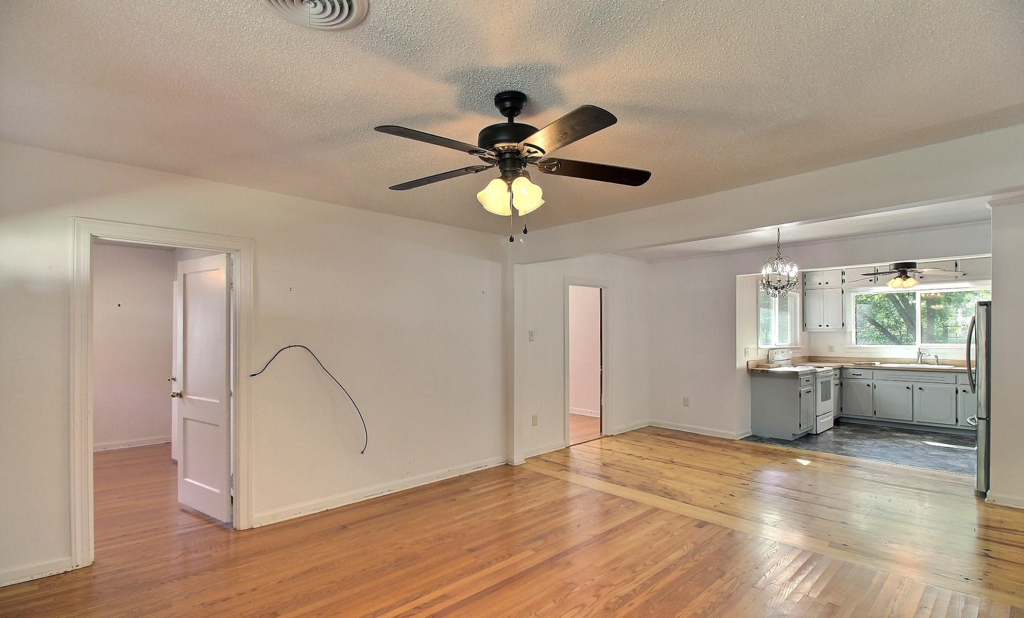 487 South Center Street Collierville, TN 38017 - Photo 16 of 25 a view of an empty room with window and wooden floor