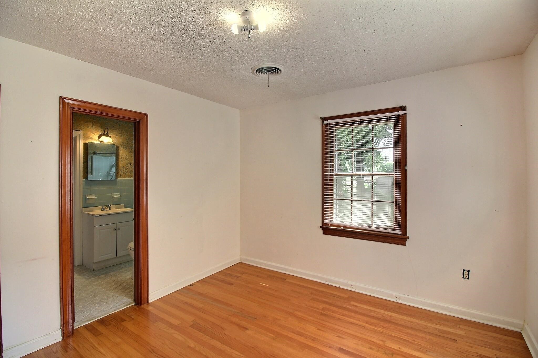 487 South Center Street Collierville, TN 38017 - Photo 17 of 25 wooden floor and windows in a room