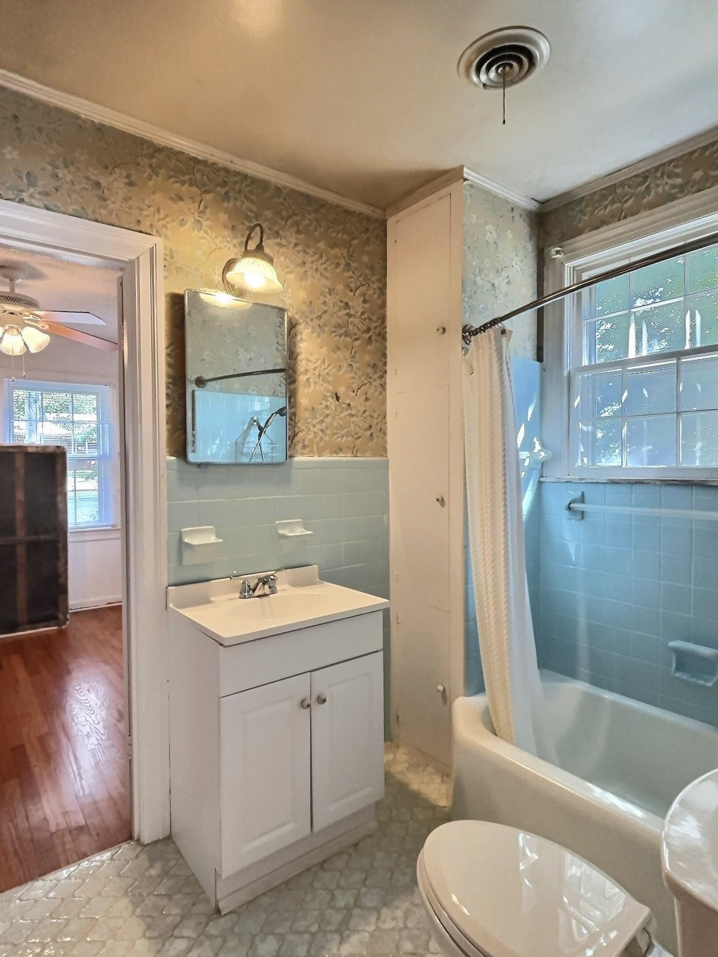 487 South Center Street Collierville, TN 38017 - Photo 19 of 25 a bathroom with a sink toilet and shower