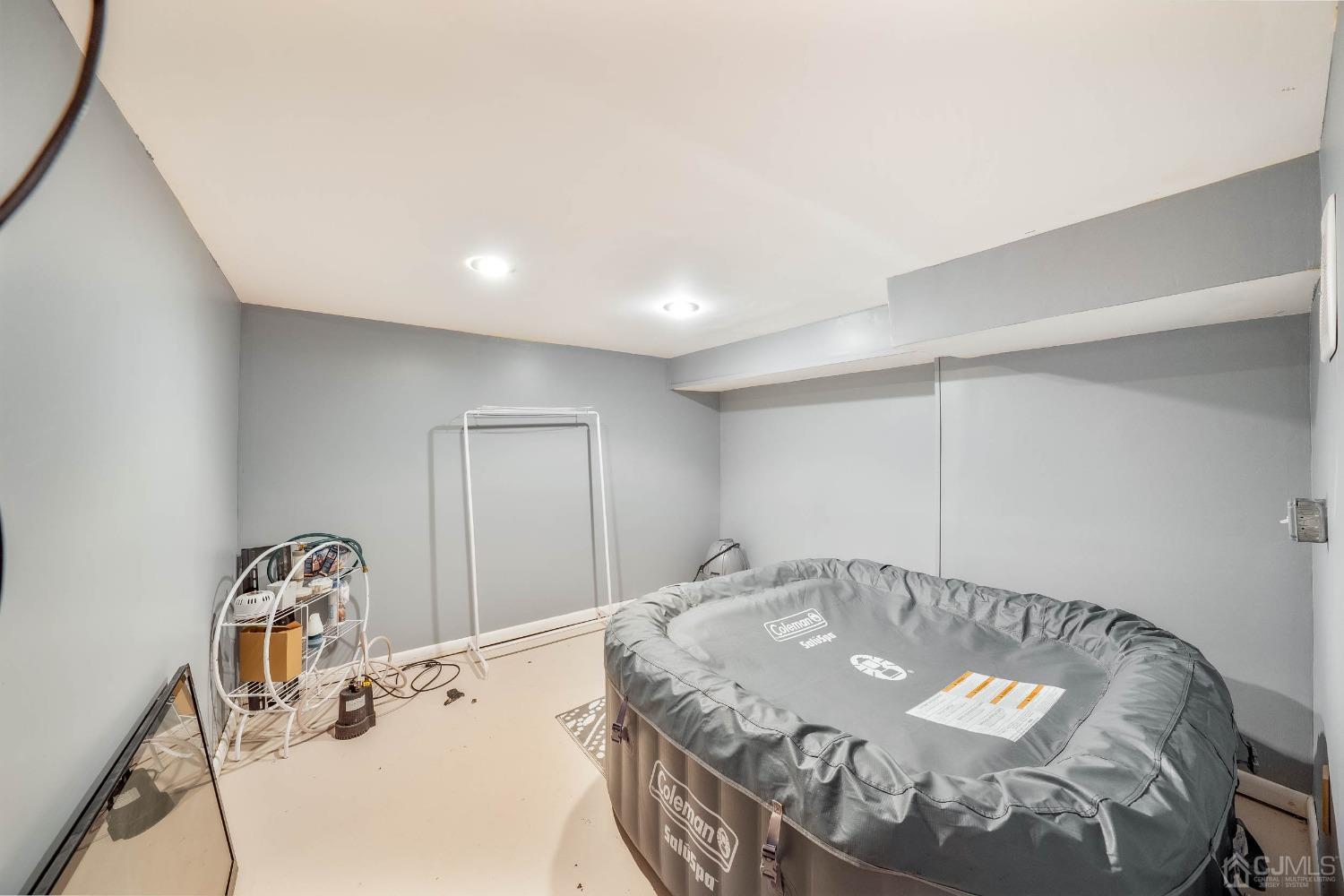5 Mercer Road Old Bridge, NJ 08857 - Photo 23 of 27 a bedroom with a bed and a table