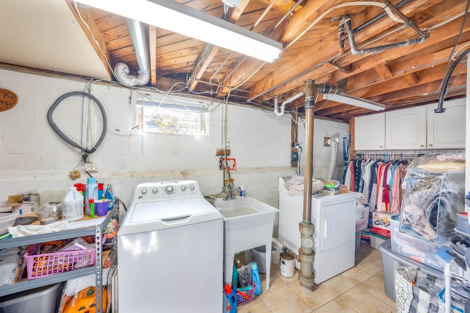 5 Mercer Road Old Bridge, NJ 08857 - Photo 24 of 27 a utility room with fridge dryer and washer
