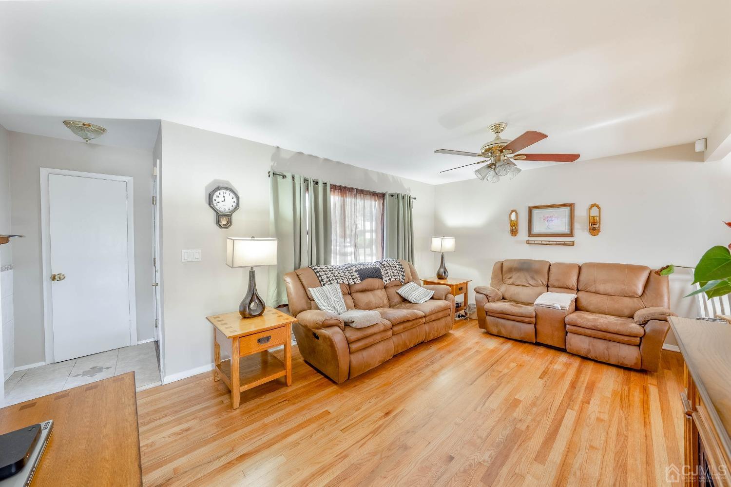5 Mercer Road Old Bridge, NJ 08857 - Photo 4 of 27 a living room with furniture and a wooden floor