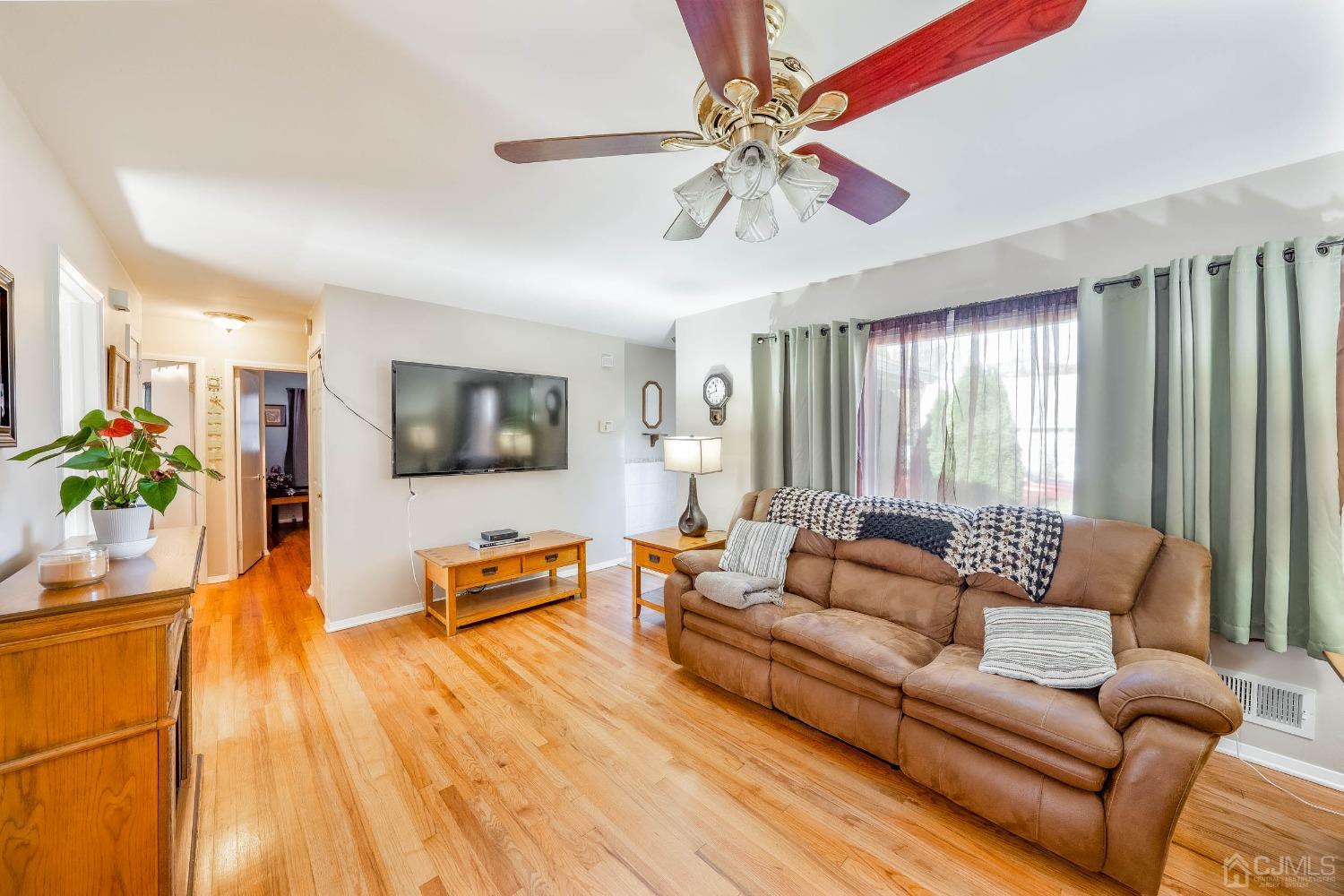 5 Mercer Road Old Bridge, NJ 08857 - Photo 5 of 27 a living room with furniture and a flat screen tv