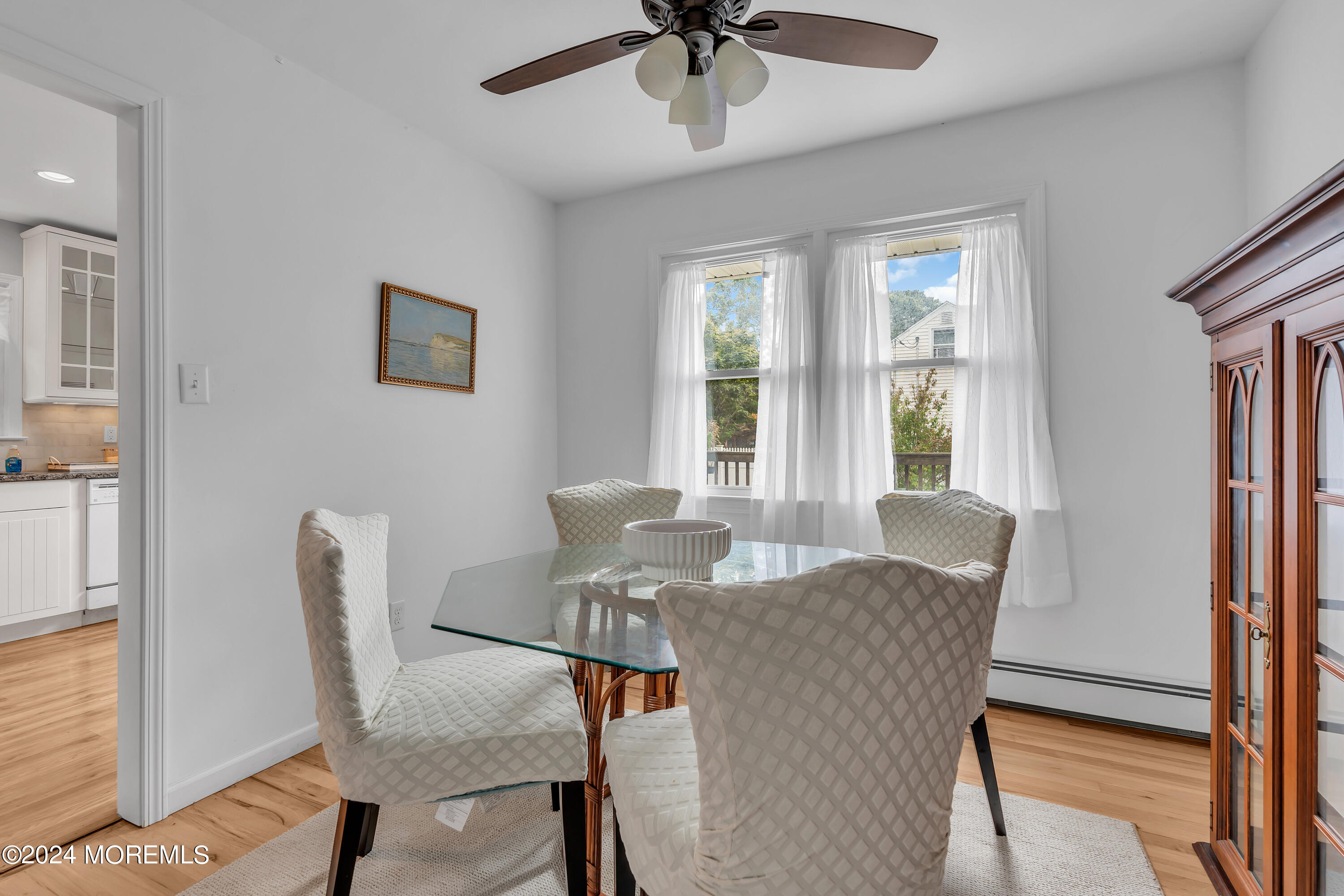 2600 River Road Point Pleasant, NJ 08742 - Photo 17 of 67 a view of a dining room with furniture and a window