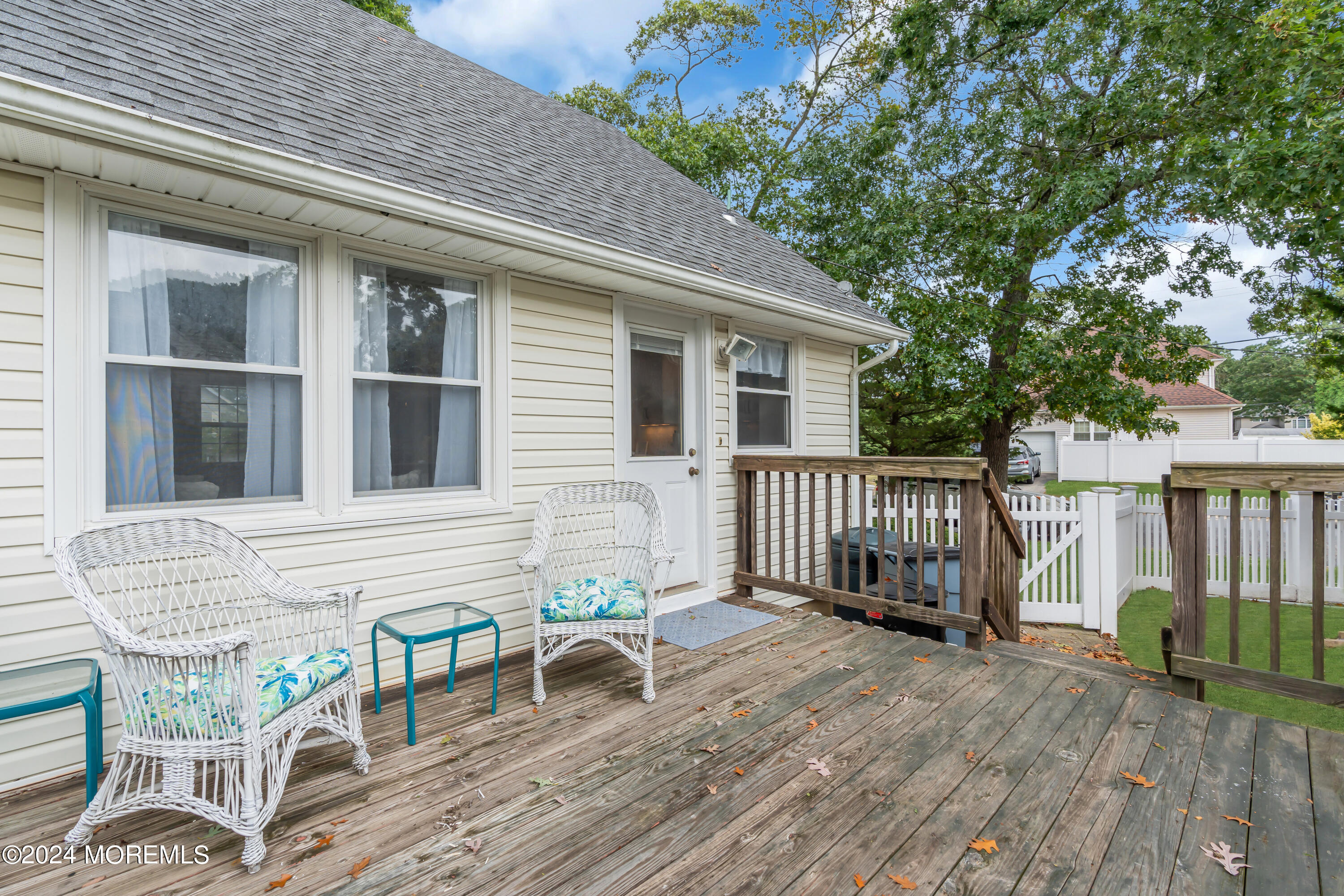 2600 River Road Point Pleasant, NJ 08742 - Photo 39 of 67 a backyard of a house with table and chairs