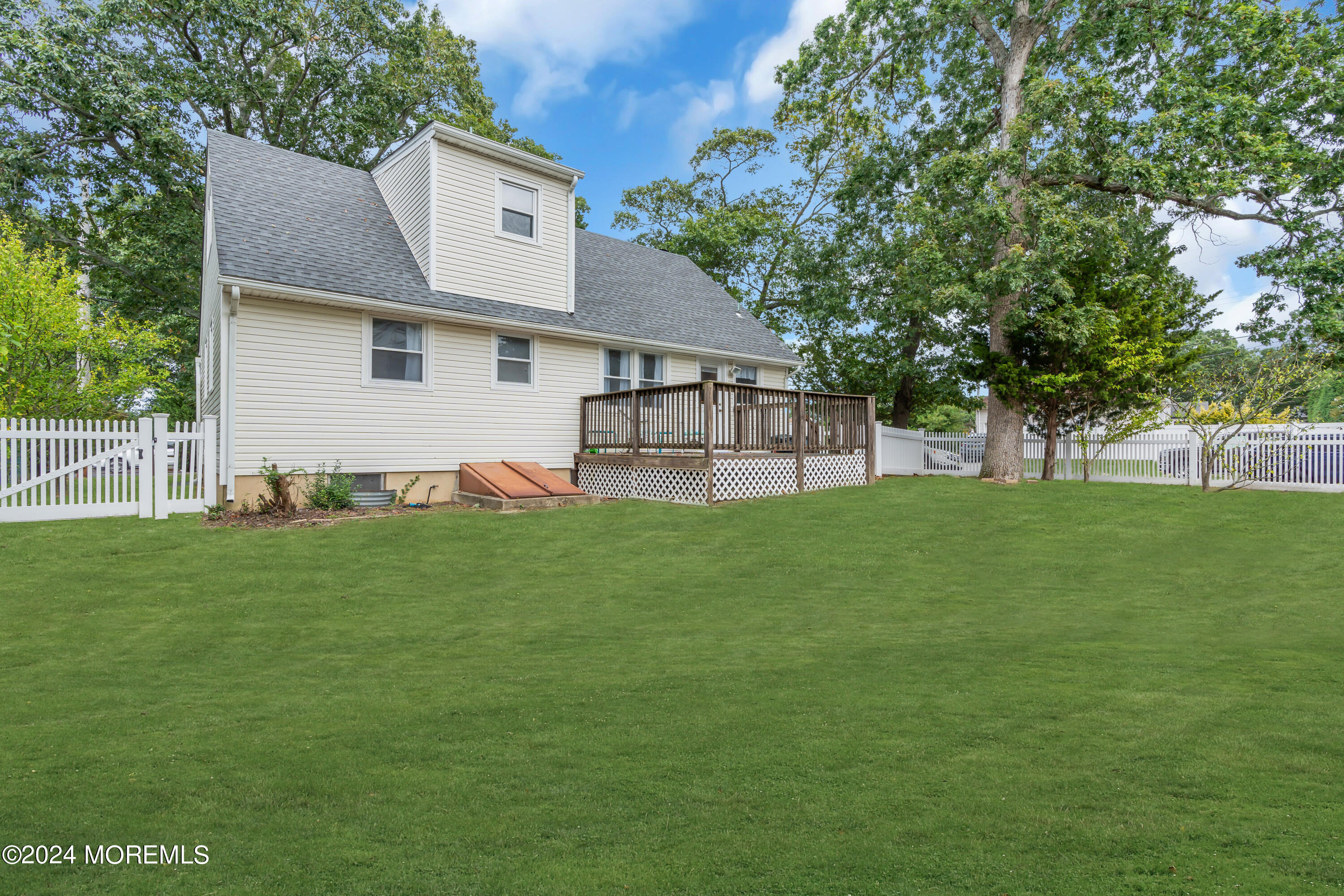 2600 River Road Point Pleasant, NJ 08742 - Photo 47 of 67 a view of a house with a backyard
