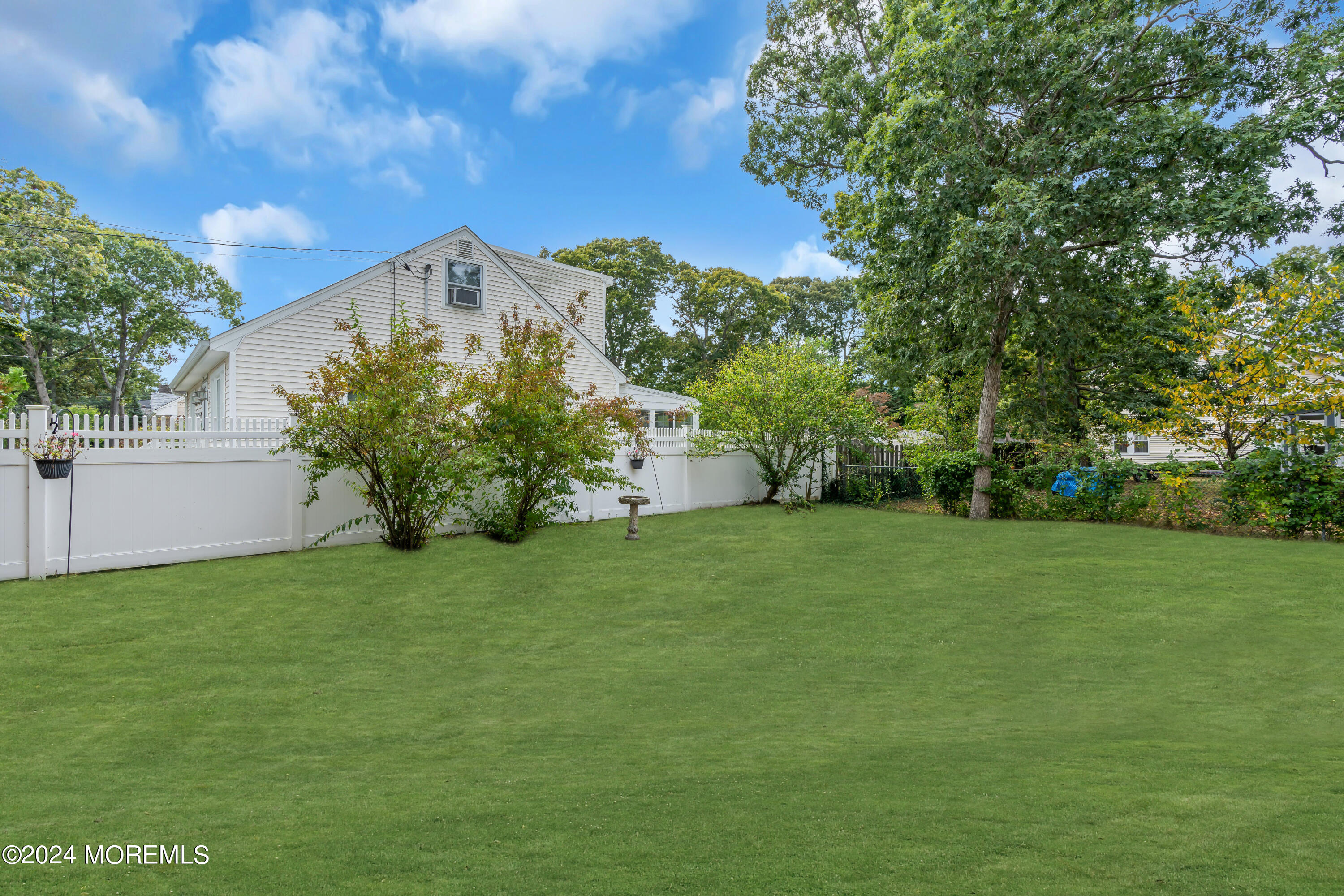 2600 River Road Point Pleasant, NJ 08742 - Photo 51 of 67 a front view of a house with a yard