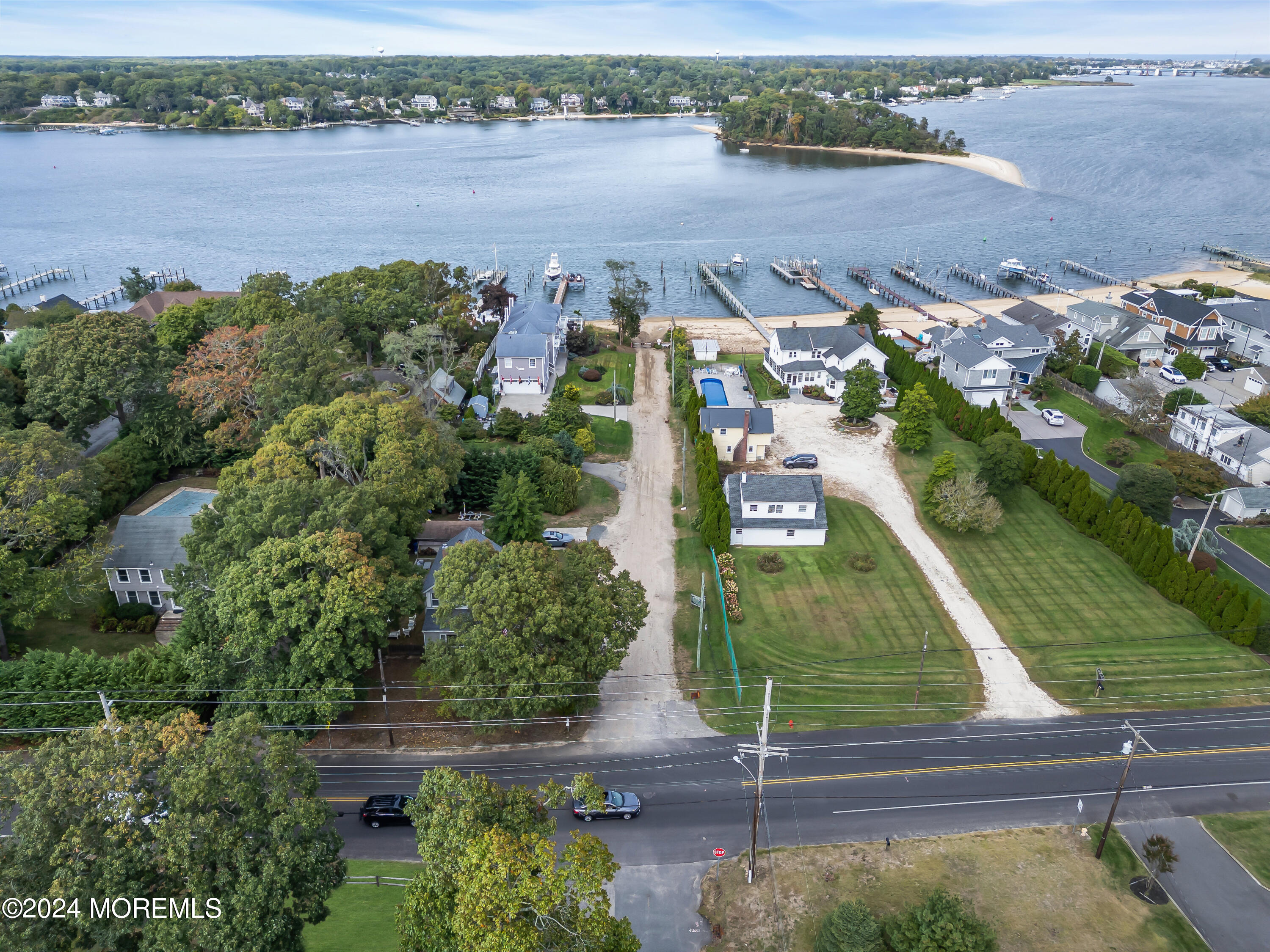 2600 River Road Point Pleasant, NJ 08742 - Photo 57 of 67 an aerial view of a house with outdoor space and lake view in back