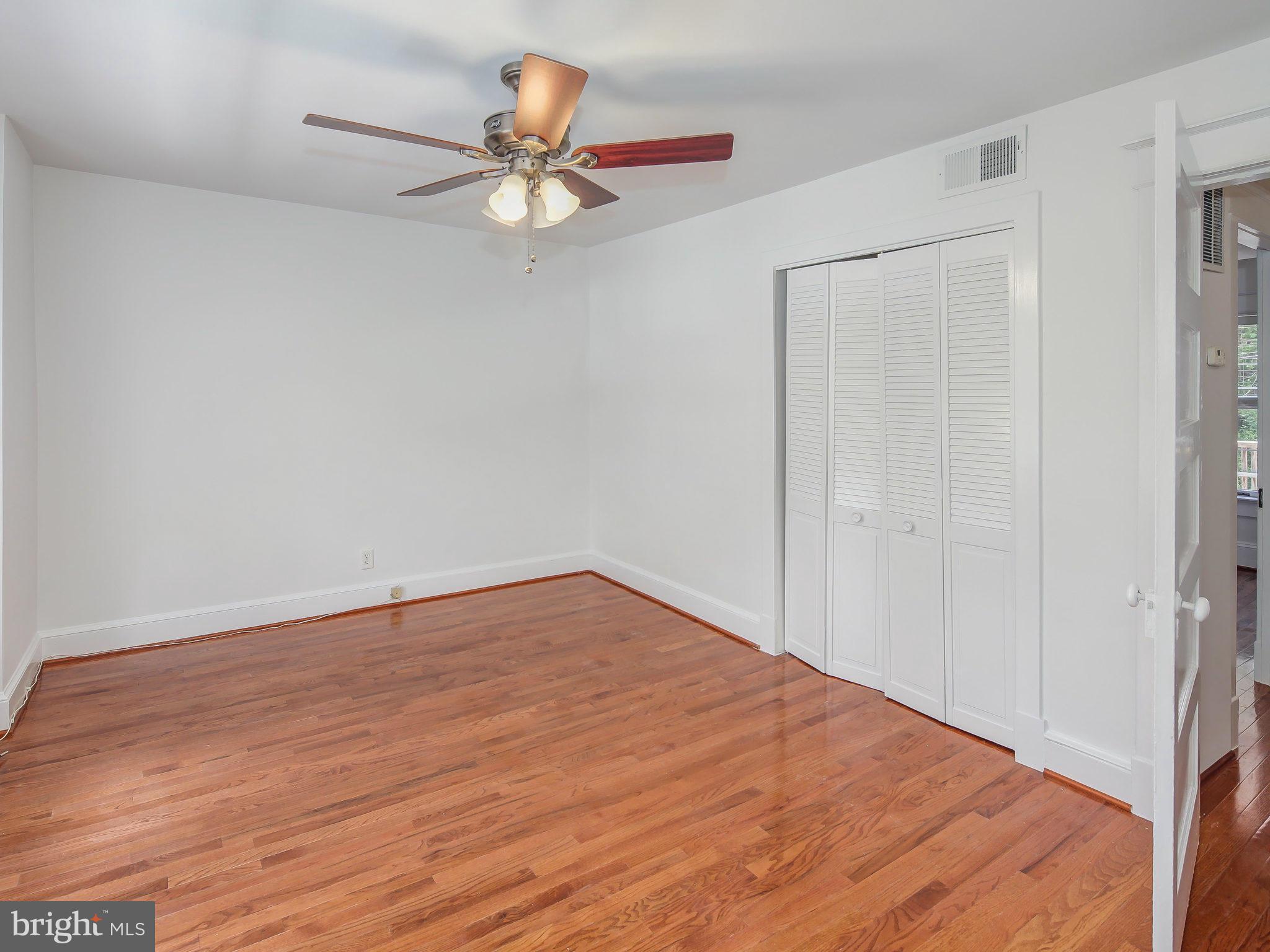 1920 35th Place Northwest Washington, DC 20007 - Photo 19 of 30 a view of empty room with wooden floor