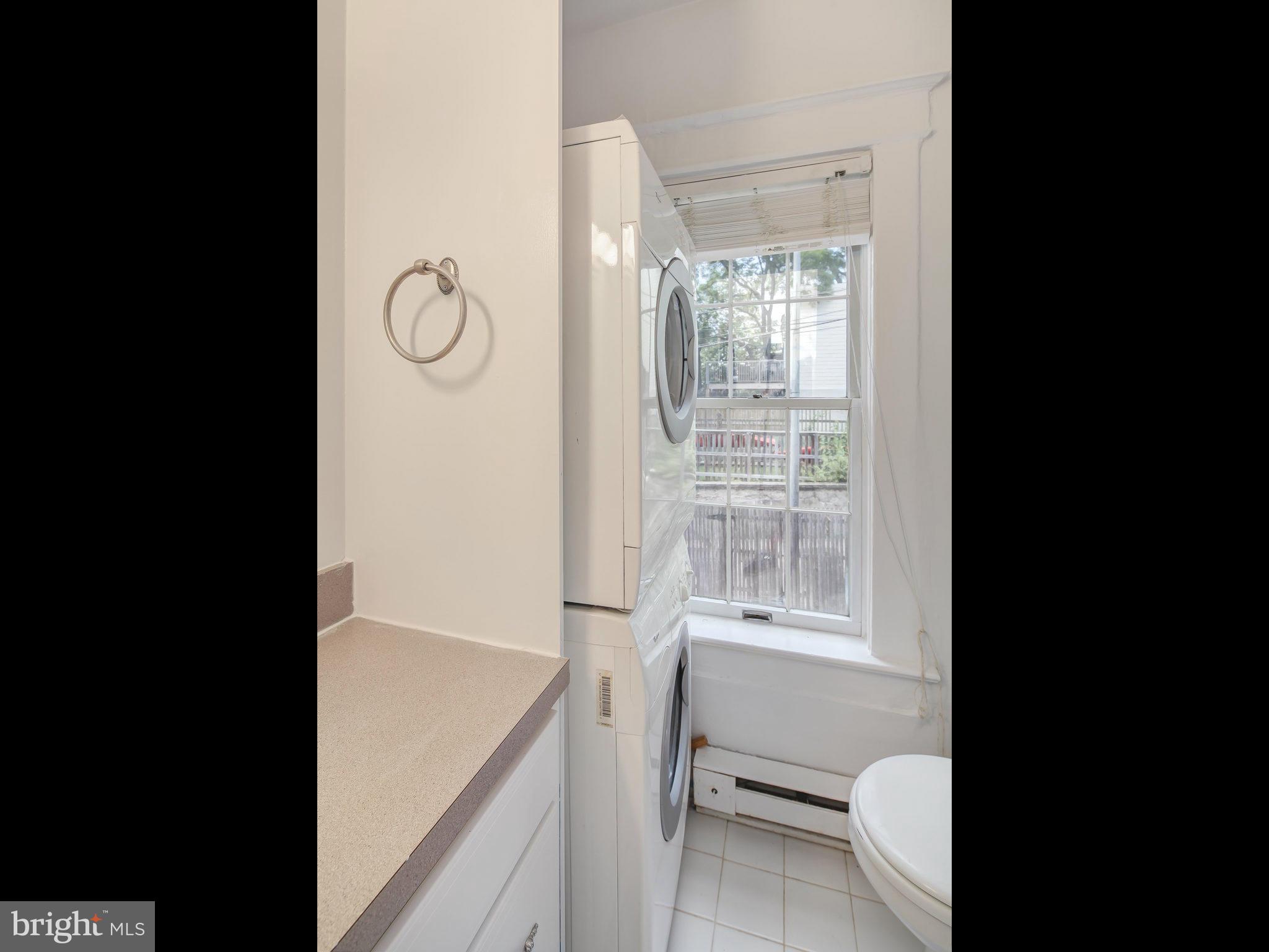 1920 35th Place Northwest Washington, DC 20007 - Photo 24 of 30 a view of a bathroom with tub and window