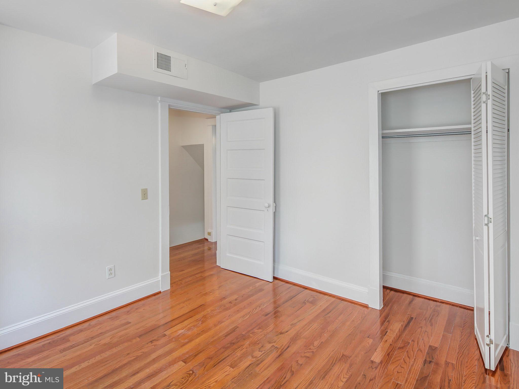 1920 35th Place Northwest Washington, DC 20007 - Photo 25 of 30 a view of empty room with wooden floor