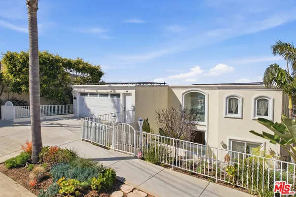 a view of outdoor kitchen and patio