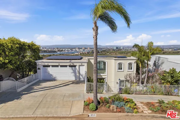 a bird view of a house with a yard