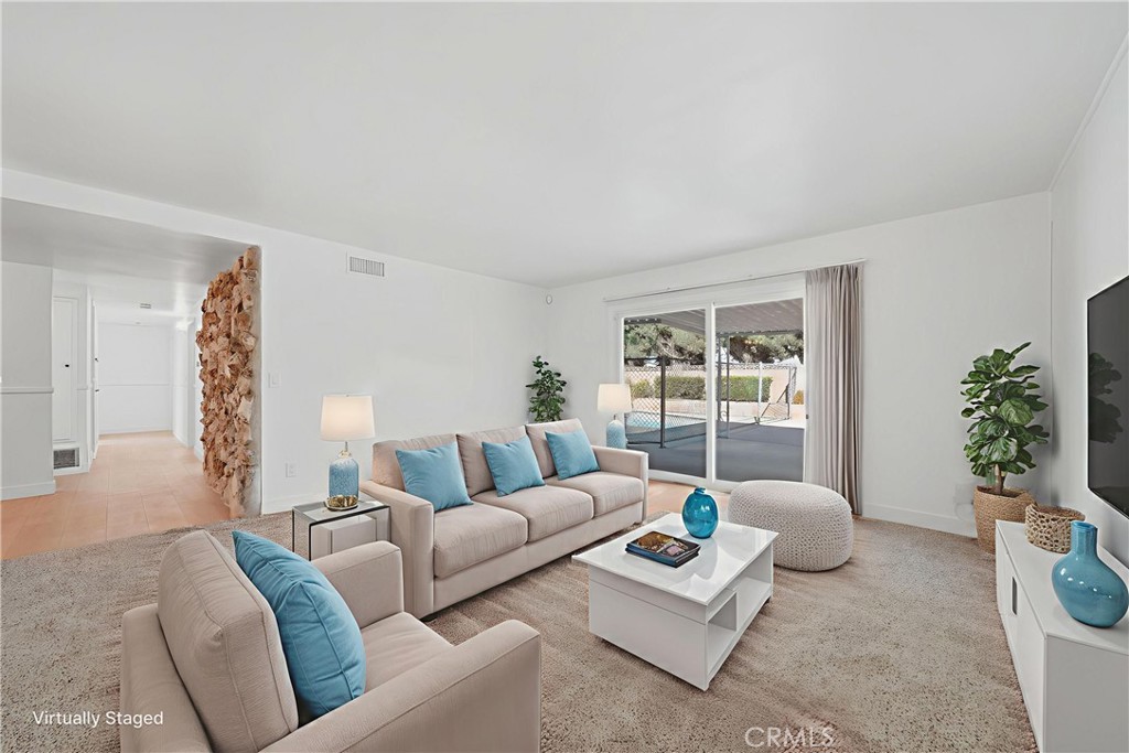 11709 Pounds Avenue Whittier, CA 90604 - Photo 15 of 39 a living room with furniture and a large window