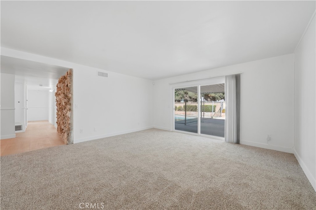 11709 Pounds Avenue Whittier, CA 90604 - Photo 16 of 39 Living room view looking down hallway & backyard