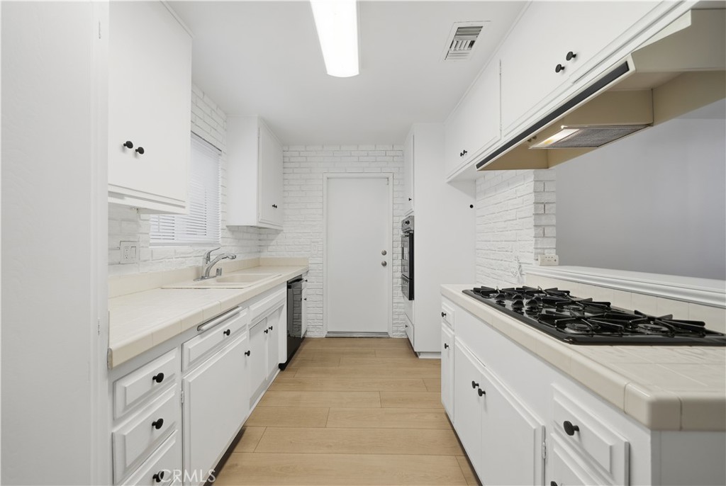 11709 Pounds Avenue Whittier, CA 90604 - Photo 8 of 39 KItchen view looking towards garage entry