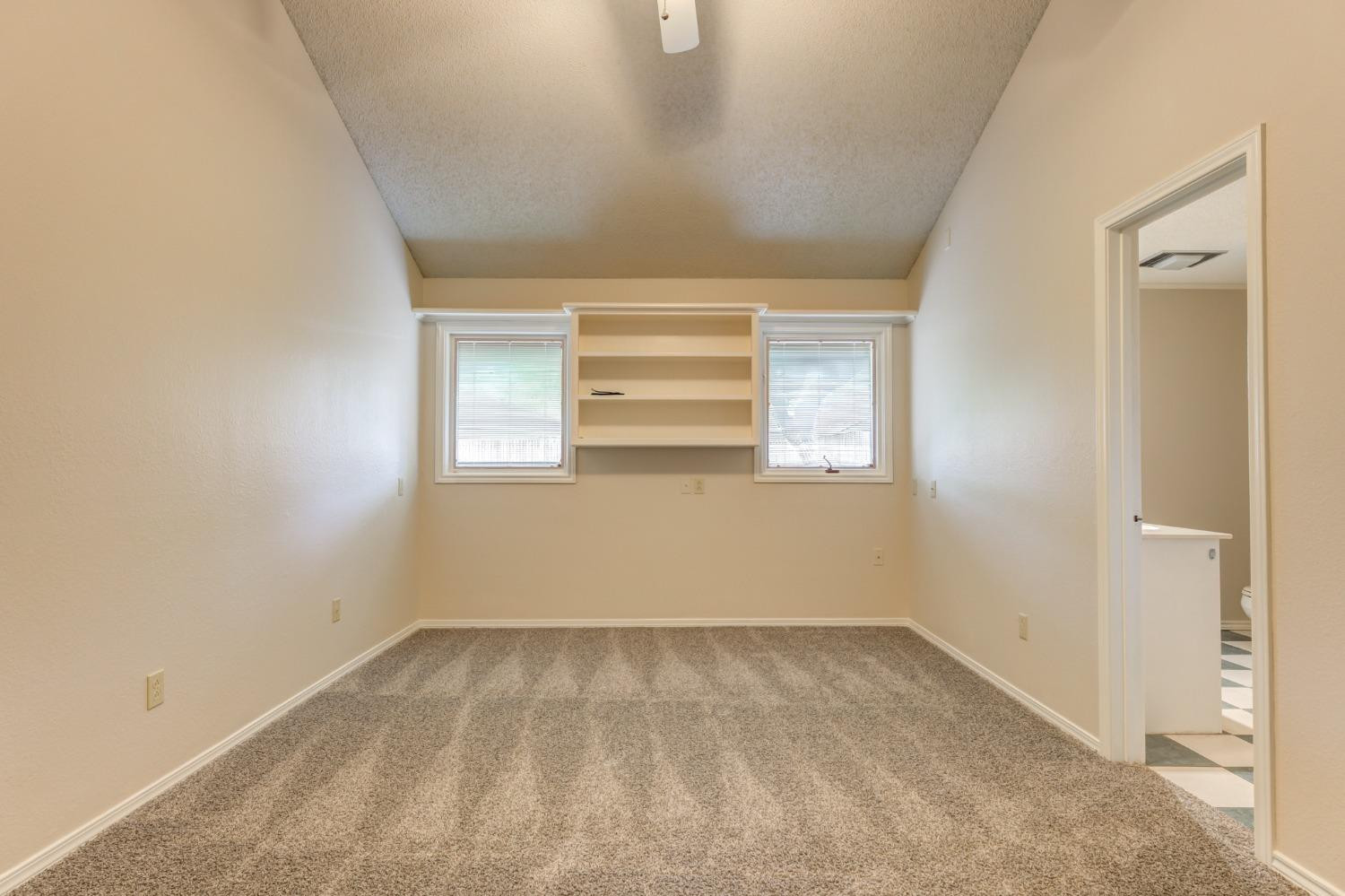 4002 88th Place Lubbock, TX 79423 - Photo 34 of 50 Guest Bedroom with Private Bath