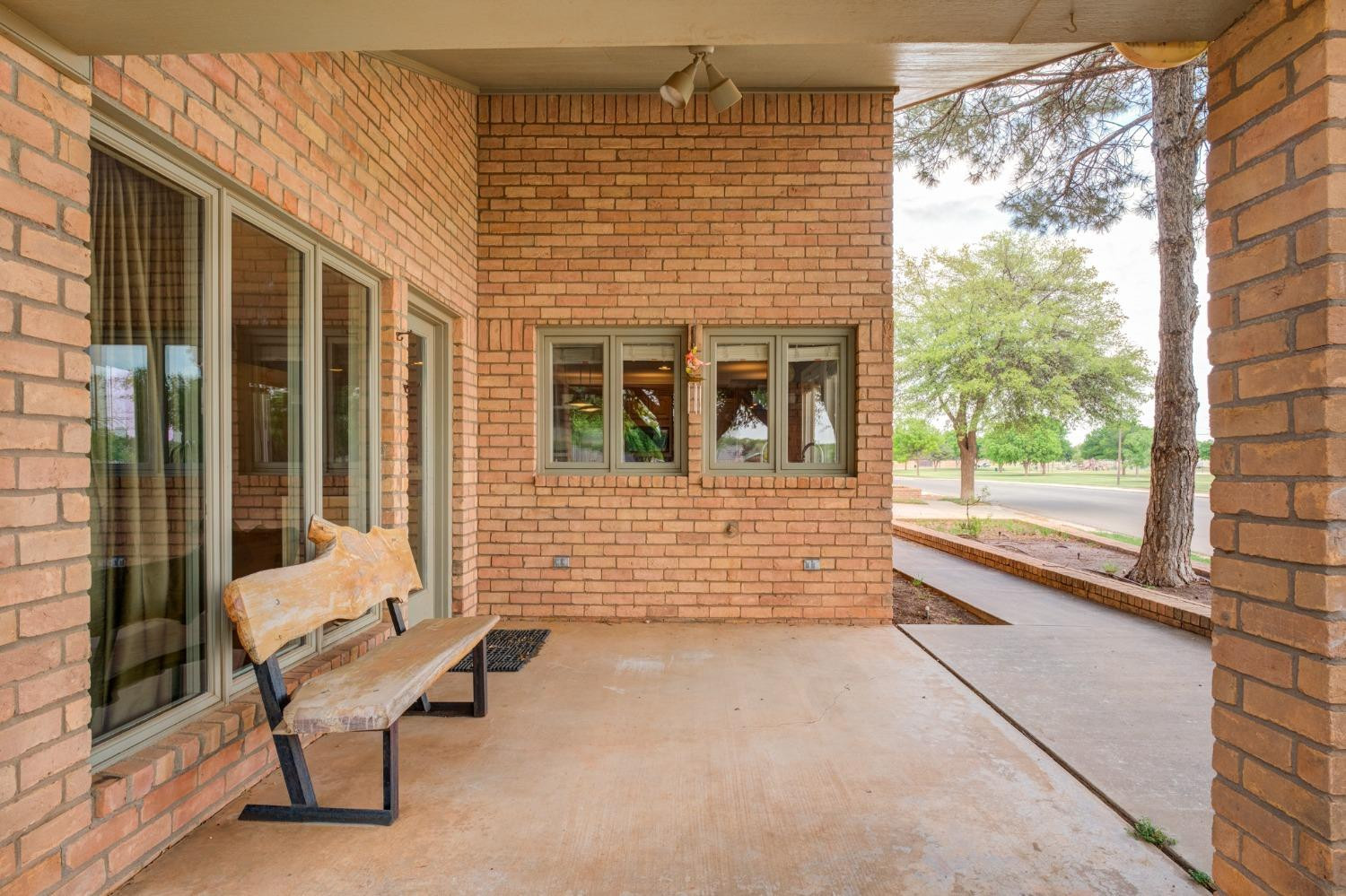 4002 88th Place Lubbock, TX 79423 - Photo 48 of 50 Front Covered Patio with Park Views!