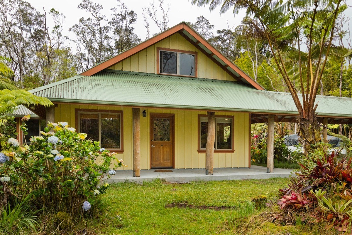 19-3882 Old Volcano Road Volcano, HI 96785 - Photo 2 of 30 front view of a house with a yard