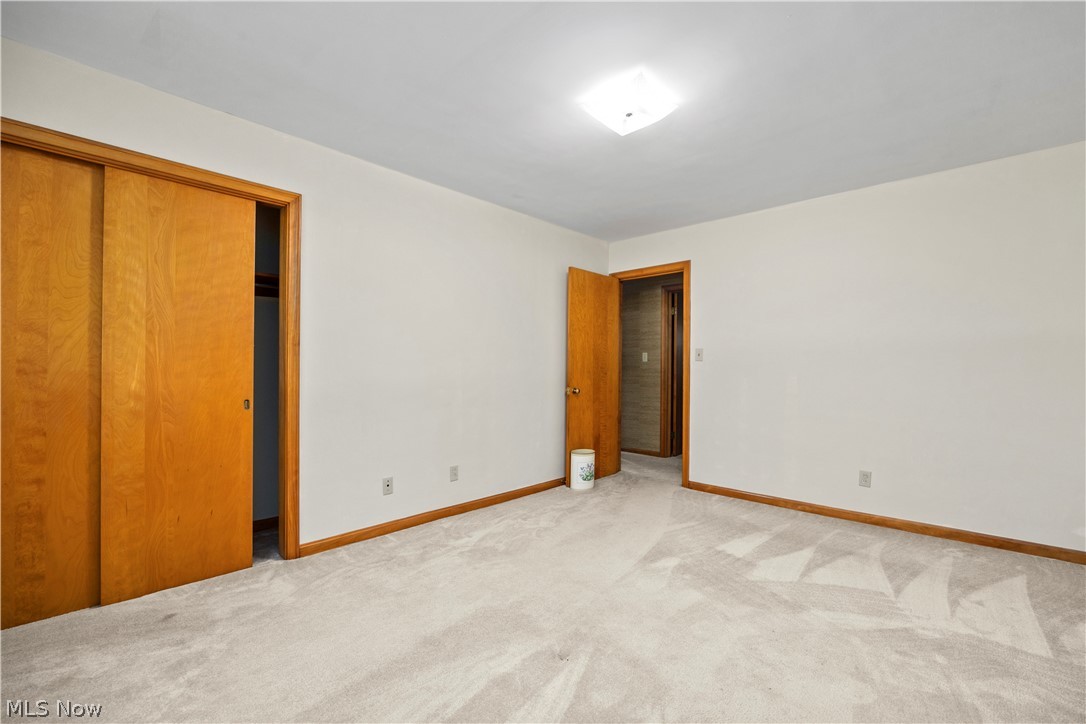 1740 Walnut Road Kent, OH 44240 - Photo 23 of 43 Neutral toned room featuring light-colored carpeting and white walls