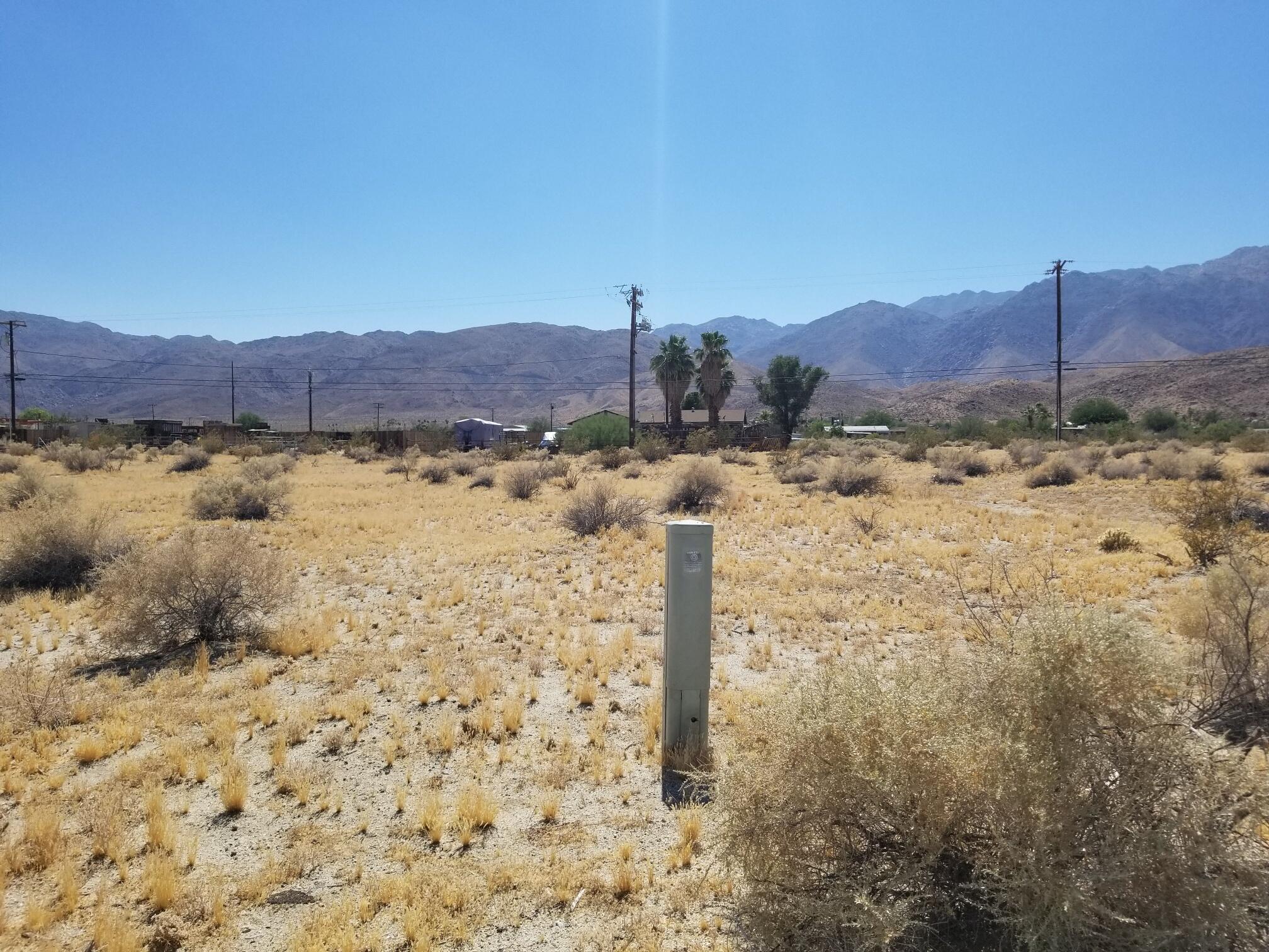 Lot 9 Frying Pan Road Borrego Springs, CA 92004 - Photo 11 of 15 a view of a backyard of a house with a mountain