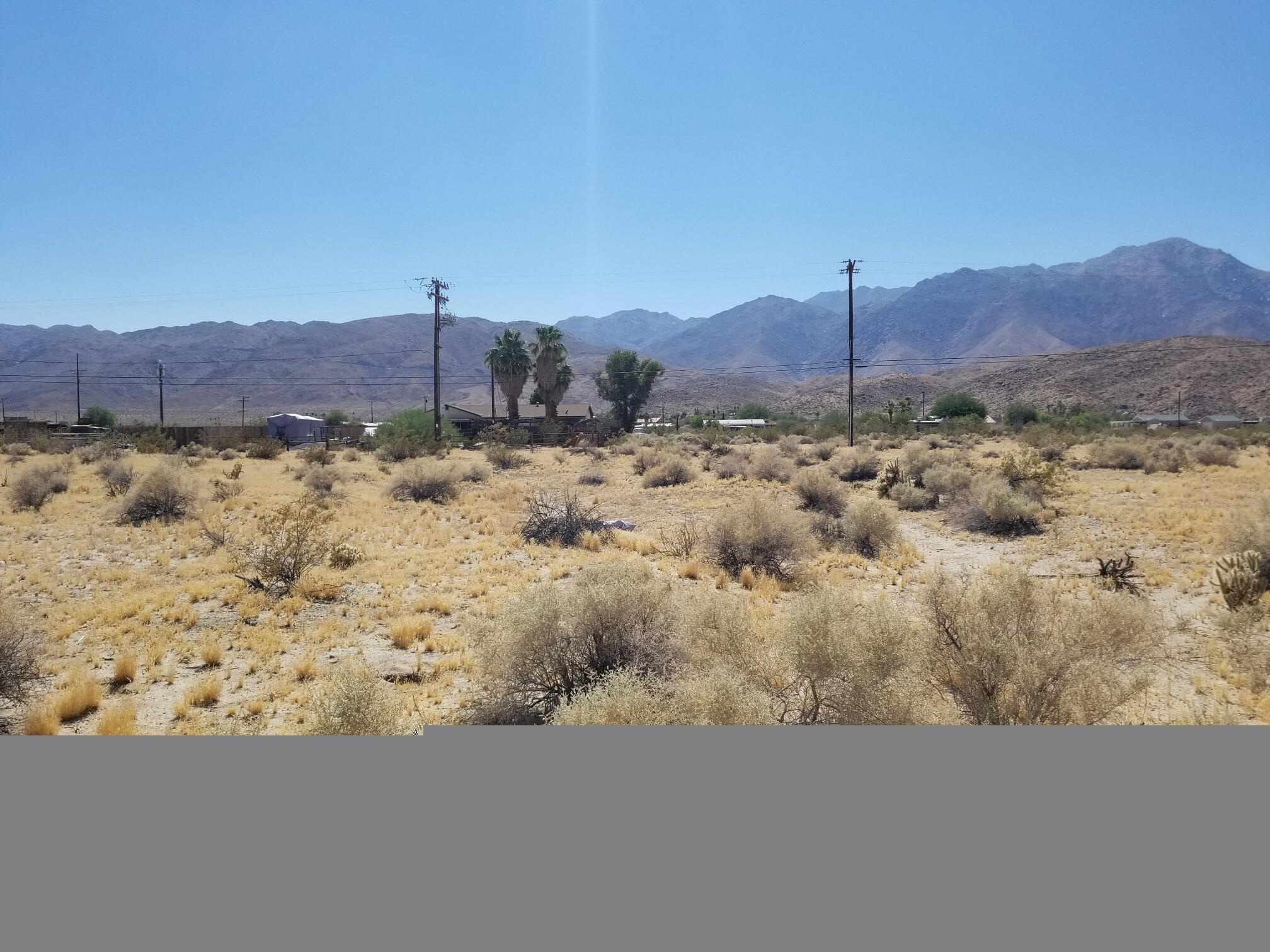 Lot 9 Frying Pan Road Borrego Springs, CA 92004 - Photo 12 of 15 a view of a city with mountains in the background