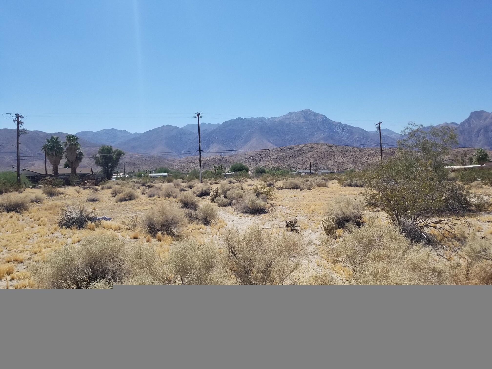 Lot 9 Frying Pan Road Borrego Springs, CA 92004 - Photo 13 of 15 a view of a dry yard with mountains in the background