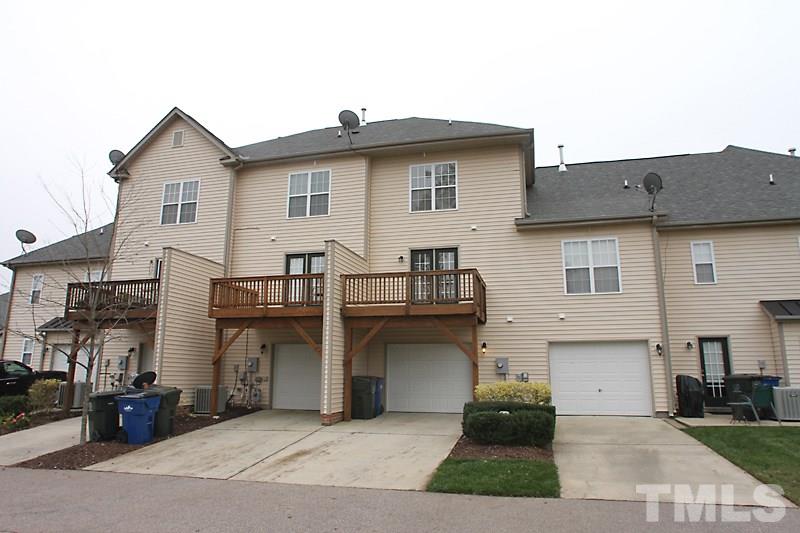 2108 Kedvale Avenue Raleigh, NC 27617 - Photo 12 of 13 Balcony off the Kitchen and Large One Car Garage with storage at rear of Town home.