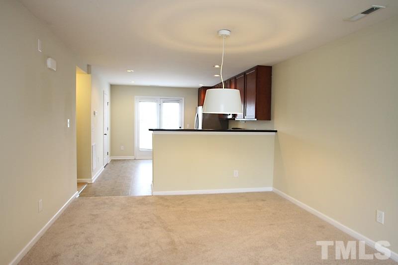 Dining area with breakfast bar.