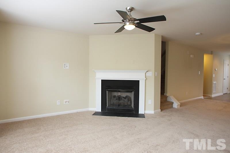 Fireplace complete with gas logs in Living Room.