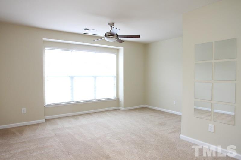 Master Bedroom with plenty of natural light to wake up to.
