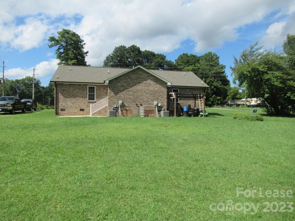 602 Victory Grove Church Road Lincolnton, NC 28092 - Photo 12 of 13 a view of a house with a yard porch and sitting area