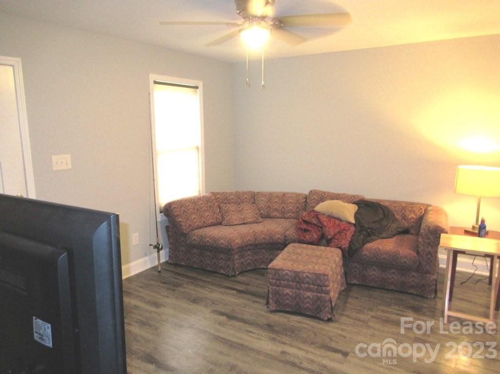 602 Victory Grove Church Road Lincolnton, NC 28092 - Photo 3 of 13 a living room with furniture and a fireplace