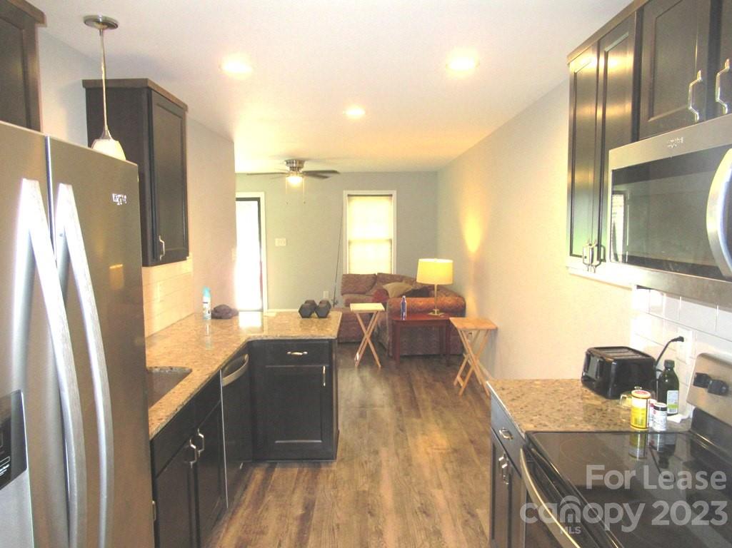 602 Victory Grove Church Road Lincolnton, NC 28092 - Photo 5 of 13 a kitchen with a sink appliances and cabinets