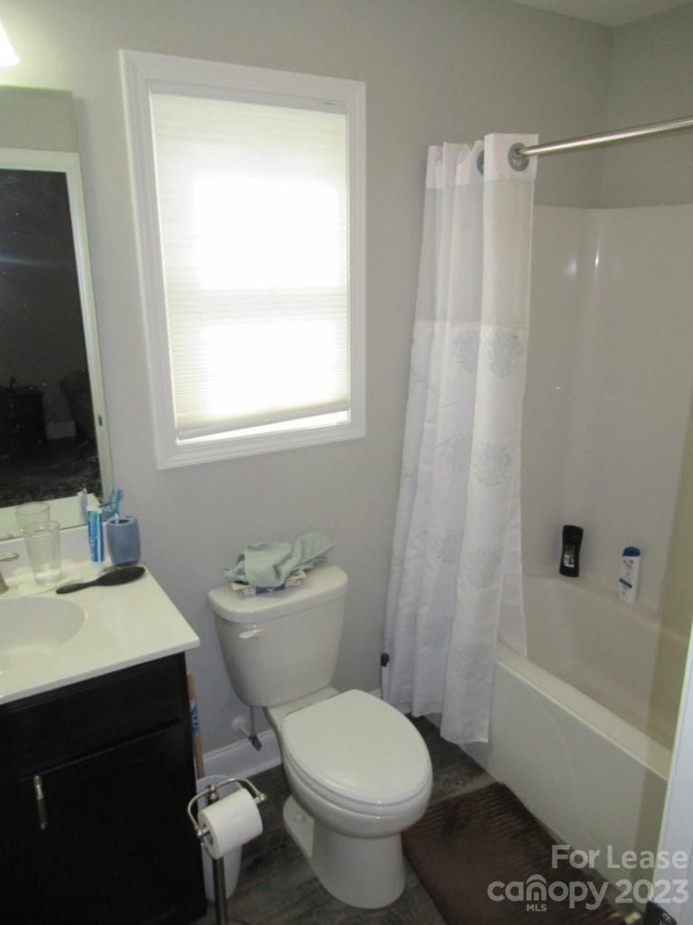 602 Victory Grove Church Road Lincolnton, NC 28092 - Photo 10 of 13 a bathroom with a sink toilet and shower