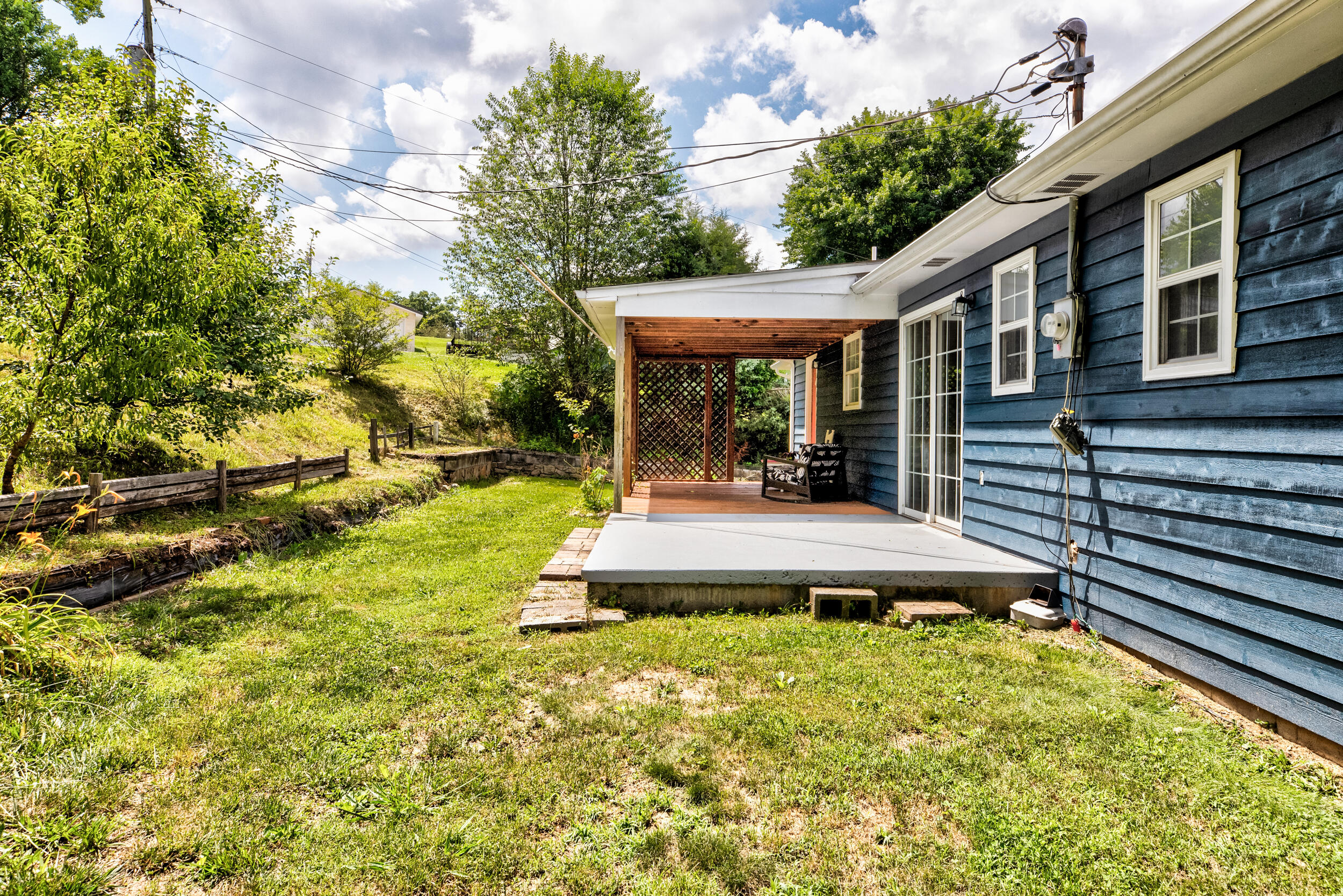 131 Rising Lane La Follette, TN 37766 - Photo 10 of 25 Covered rear porch