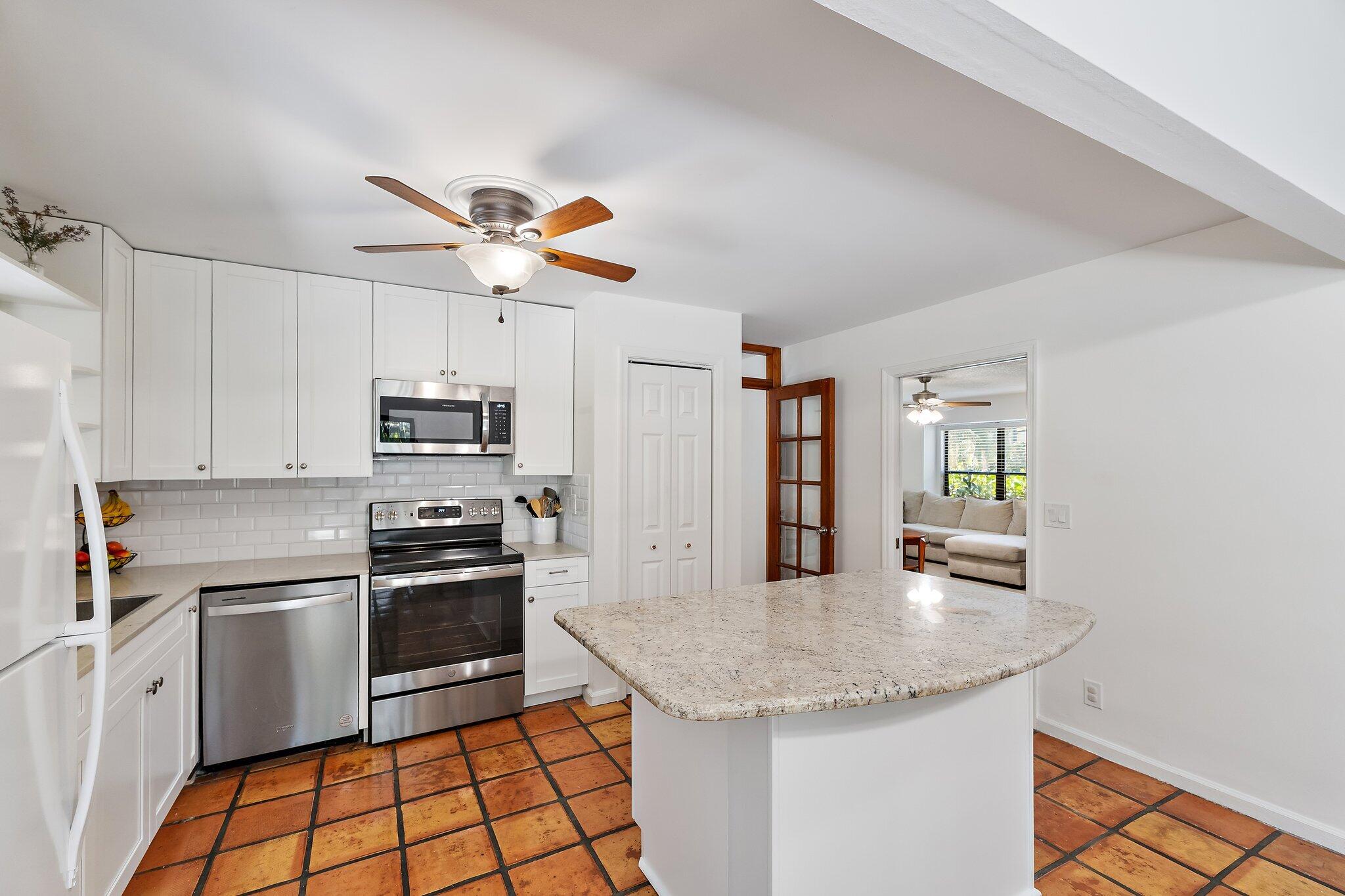 1007 Raintree Lane Palm Beach Gardens, FL 33410 - Photo 16 of 58 kitchen 1