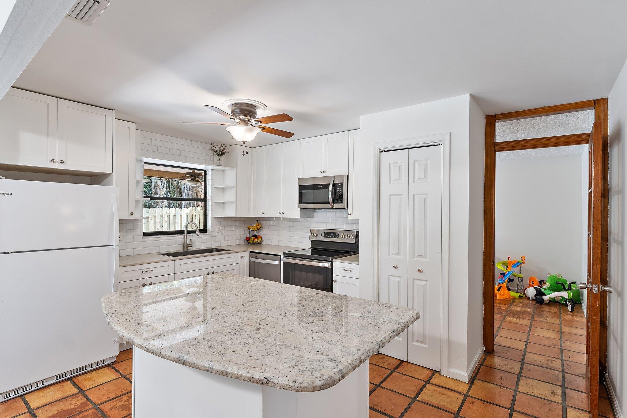 1007 Raintree Lane Palm Beach Gardens, FL 33410 - Photo 17 of 58 kitchen 2