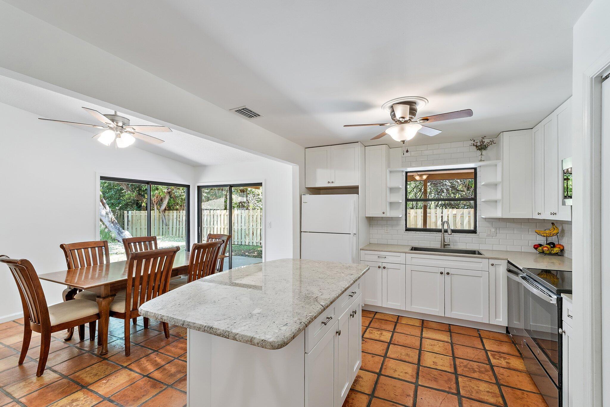 1007 Raintree Lane Palm Beach Gardens, FL 33410 - Photo 18 of 58 kitchen 3