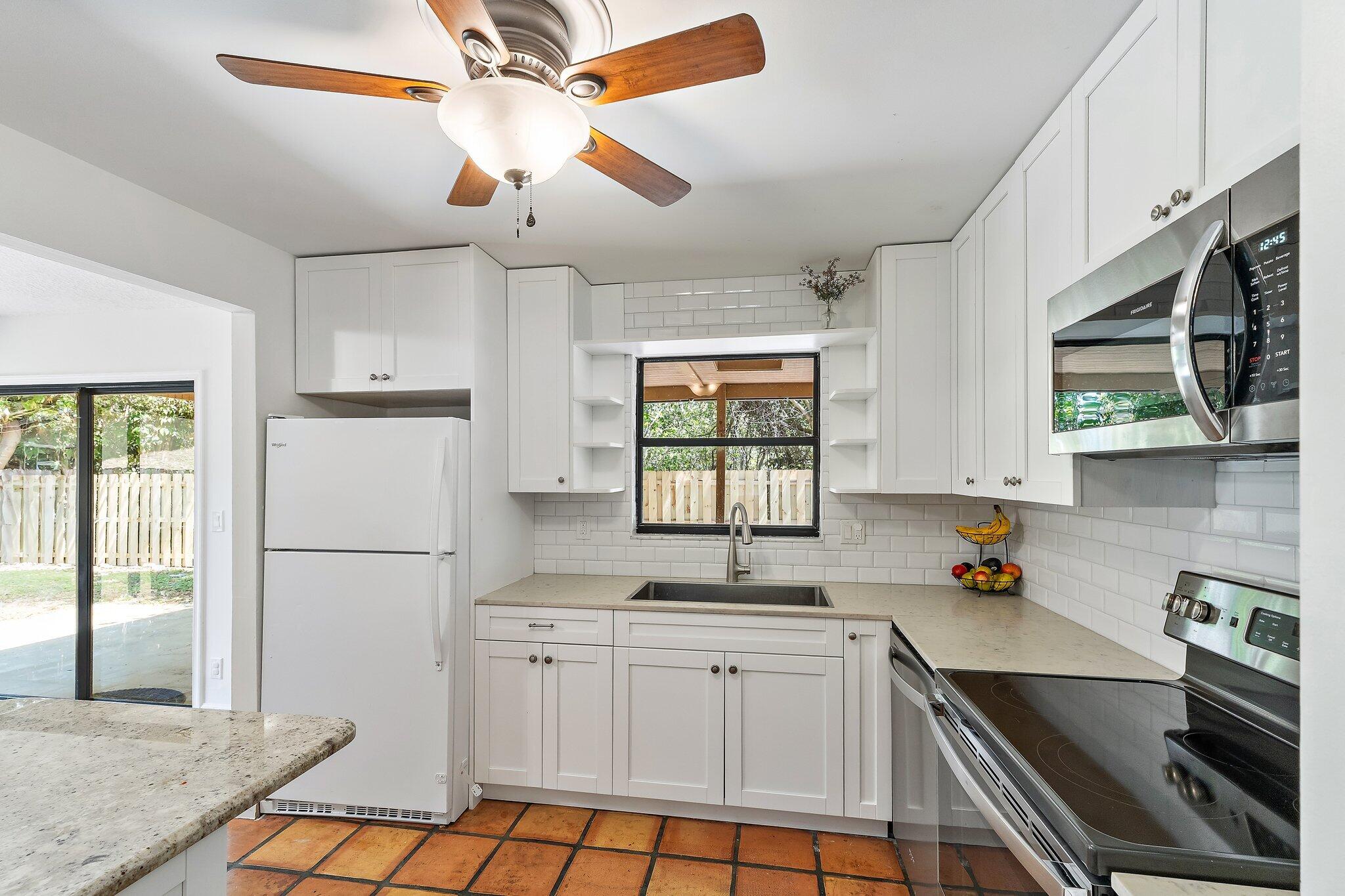 1007 Raintree Lane Palm Beach Gardens, FL 33410 - Photo 19 of 58 kitchen 4