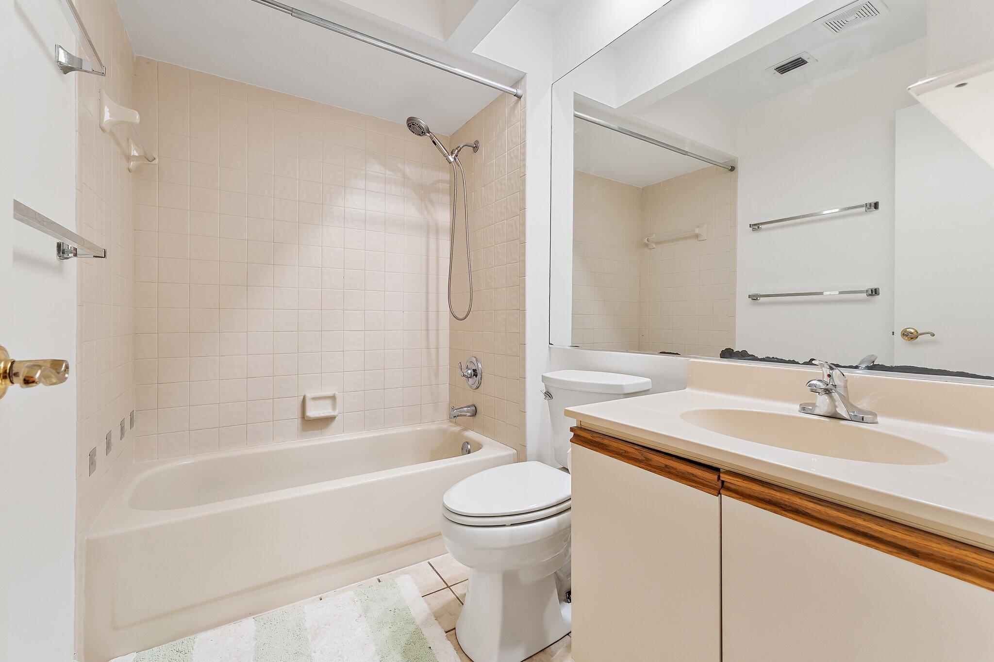 1007 Raintree Lane Palm Beach Gardens, FL 33410 - Photo 35 of 58 bathroom 1