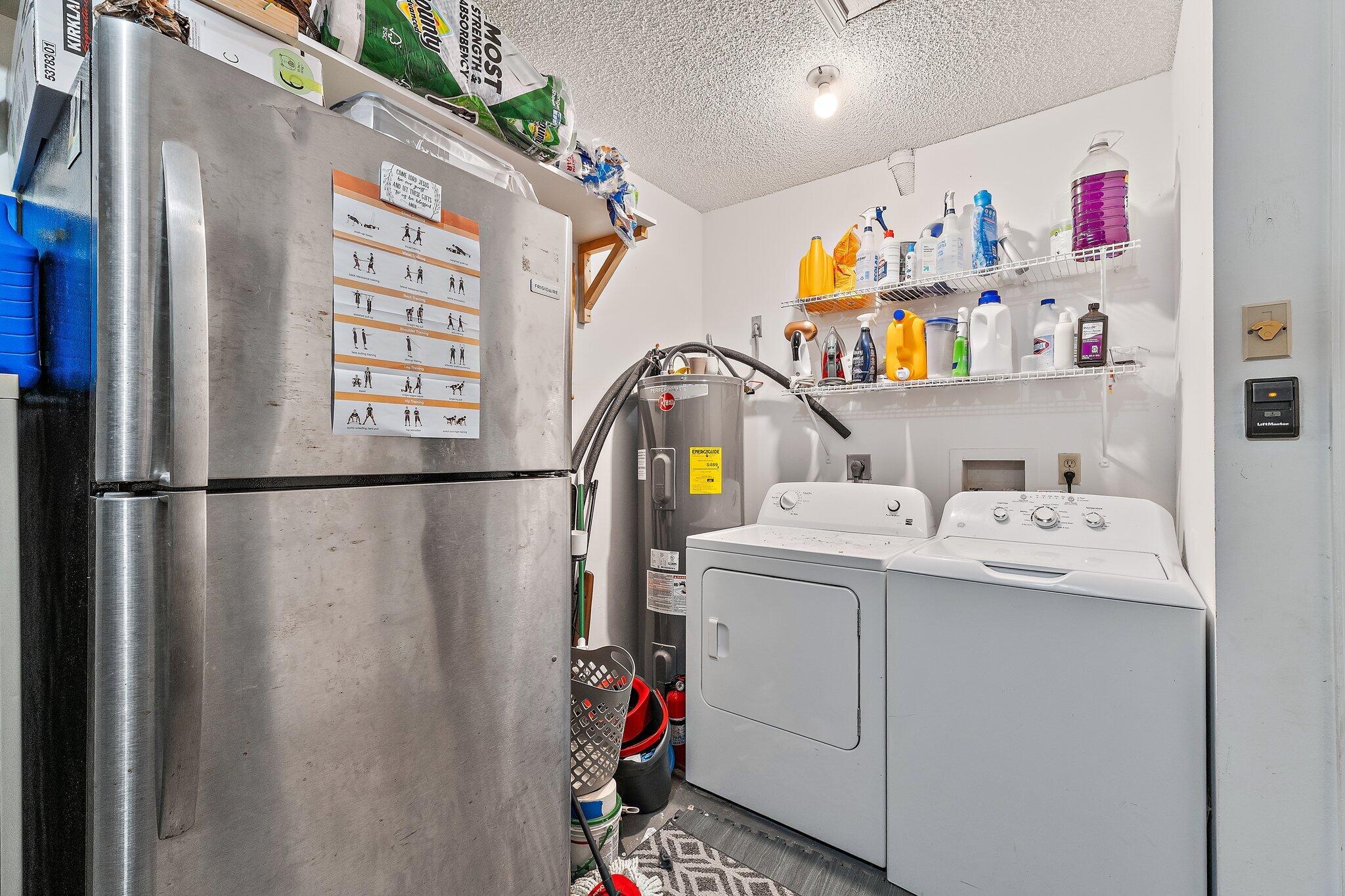 1007 Raintree Lane Palm Beach Gardens, FL 33410 - Photo 39 of 58 garage laundry