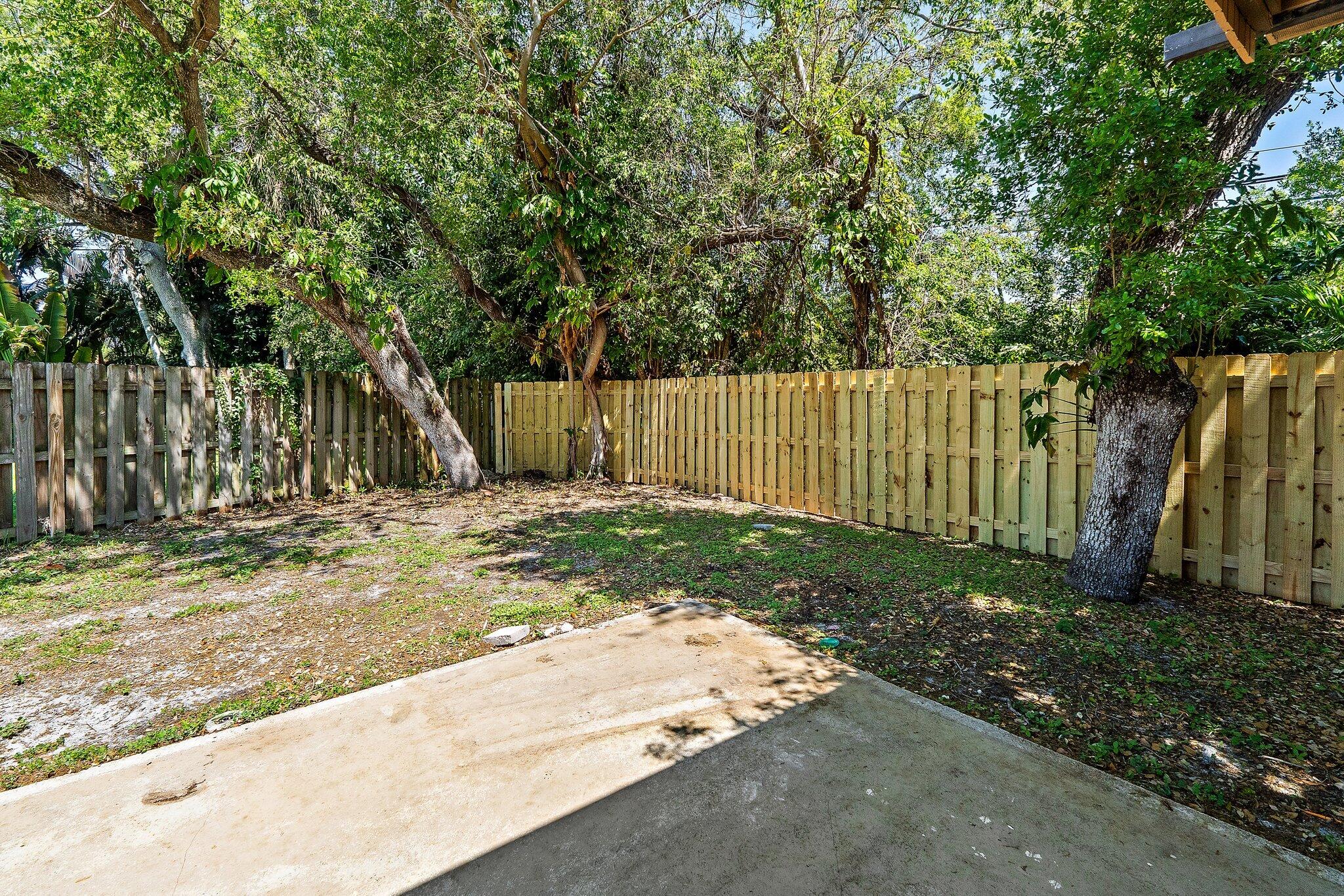 1007 Raintree Lane Palm Beach Gardens, FL 33410 - Photo 44 of 58 back yard 1