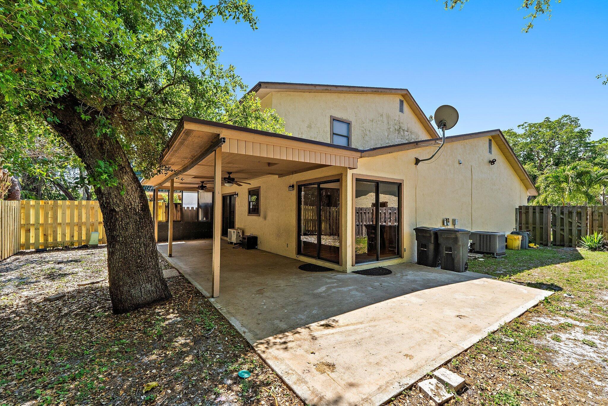 1007 Raintree Lane Palm Beach Gardens, FL 33410 - Photo 47 of 58 back yard 4