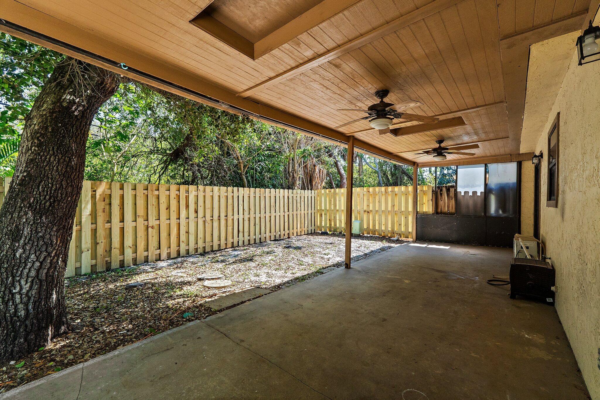 1007 Raintree Lane Palm Beach Gardens, FL 33410 - Photo 48 of 58 patio 1