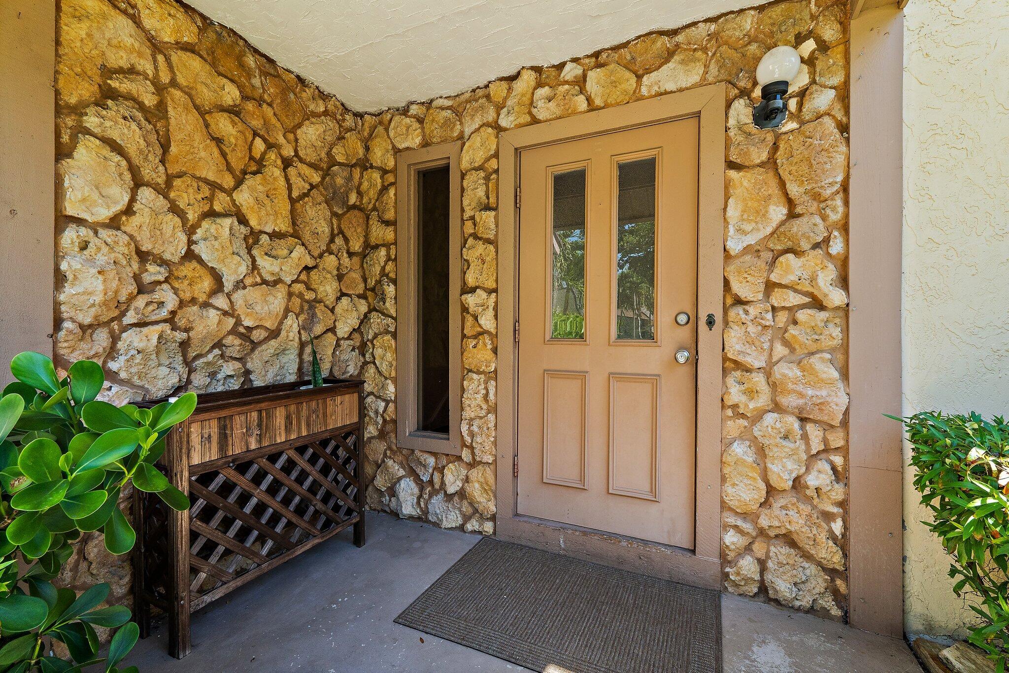 1007 Raintree Lane Palm Beach Gardens, FL 33410 - Photo 7 of 58 entry outside