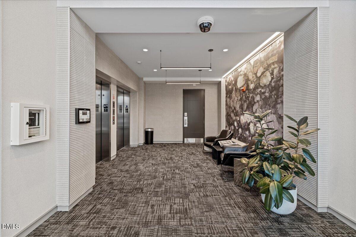 523 South West Street, Unit 505 Raleigh, NC 27601 - Photo 40 of 46 Elevator to Parking Garage