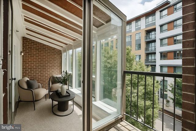 a view of a living room and a window